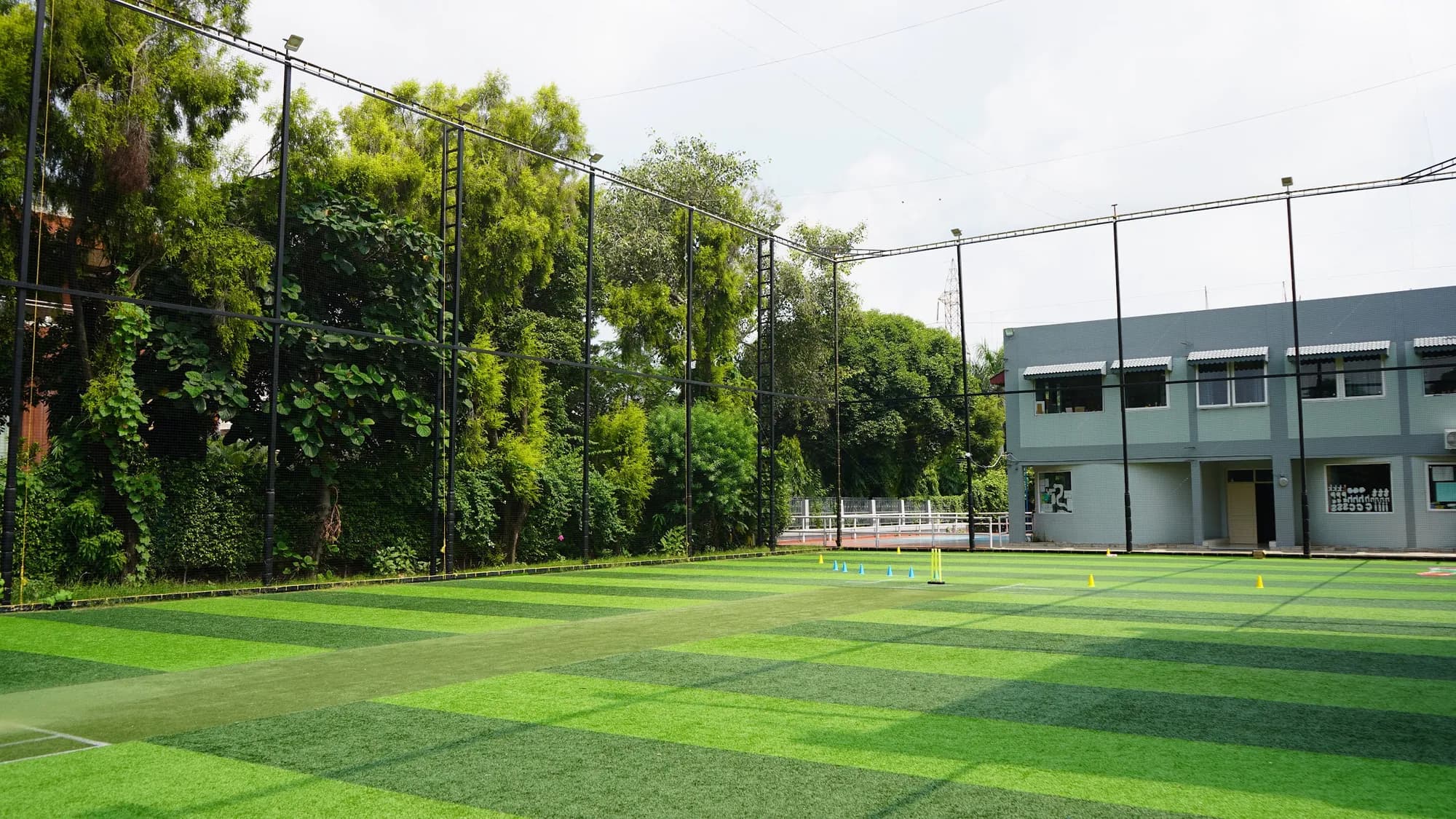 The netted SOVO sports turf on campus, ready for training
