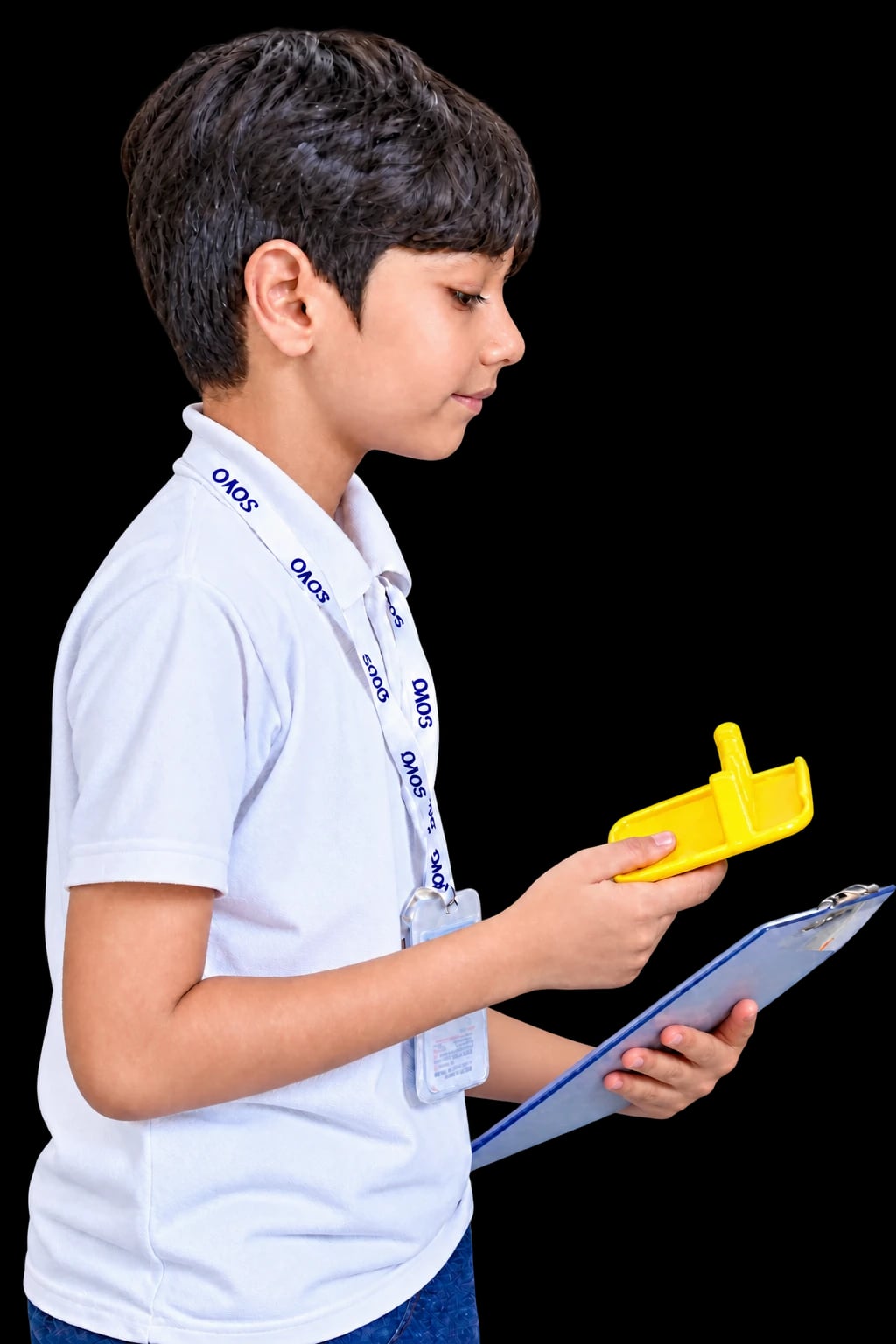A SOVO student examining a yellow robotics component while holding his project board
